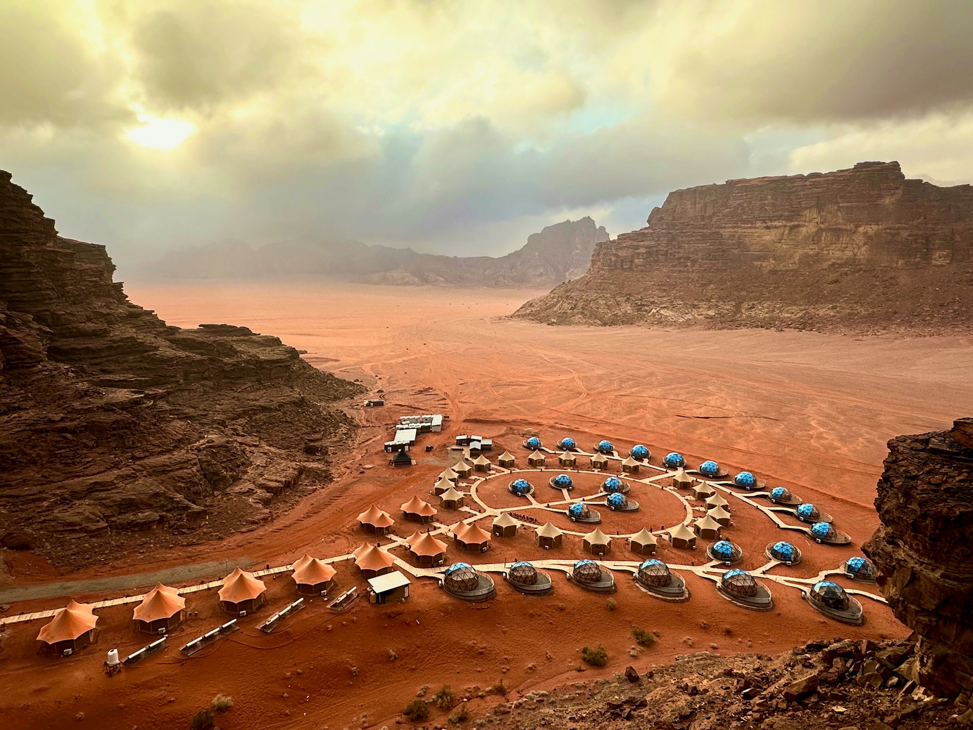 sunset, hotel, and desert in Wadi Rum Village, Jordan